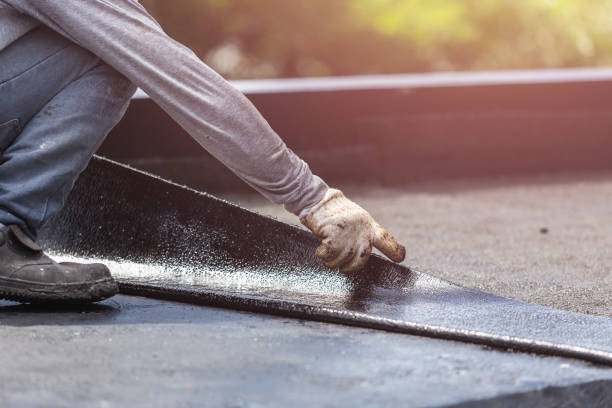 Professional Emergency Waterproofing technician working in Wellington, AL